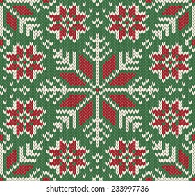 Knitted Seamless Christmas pattern. New year winter red and green background with snowflakes. Nordic style. Creative vector illustration.