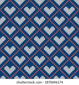 Knitted seamless cozy pattern with hearts. Nordic style sweater. Vector illustration for Valentines Day. Traditional holiday background.