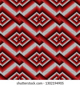 Knitted seamless decorative pattern with interlacing lines in red hues on the white background, vector as a fabric texture