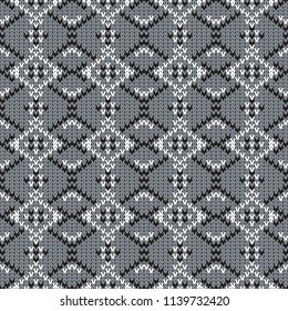 knitted seamless  geometric monochrome pattern with  rhombuses