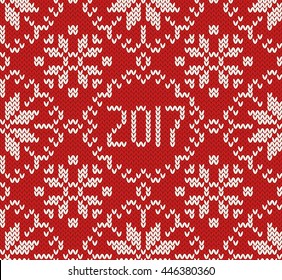 Knitted seamless jacquard pattern. New Year 2017. Red and white background. Northern style. Vector illustration.