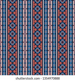 knitted seamless multicolored pattern with rhombus and vertical stripes