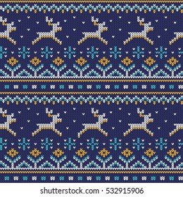 Knitted seamless ornament with running deer on a blue background. Vector illustration. Pattern is included in swatches panel.