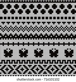Knitted seamless pattern butterflies and fair isle elements