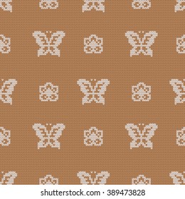 Knitted seamless pattern butterflies and flowers