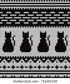 Knitted seamless pattern cats and fair isle elements