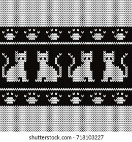 Knitted seamless pattern cats and pads