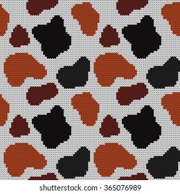 Knitted seamless pattern cow spots