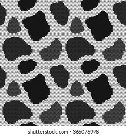 Knitted seamless pattern cow spots