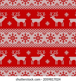 Knitted seamless pattern with deers, snowflakes, and scandinavian ornament. Red and white sweater background for Christmas, New Year or winter design. Vector illustration.