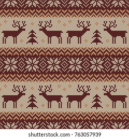 Knitted seamless pattern with deers and traditional scandinavian ornament. Brown, beige and white sweater background for Christmas or winter design. Vector illustration.