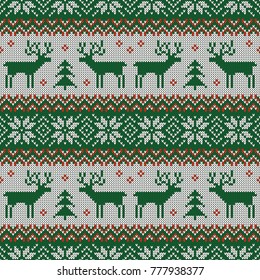 Knitted seamless pattern with deers and traditional scandinavian ornament. Green, red and white sweater background for Christmas or winter design. Vector illustration.