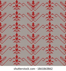 Knitted seamless pattern of fancy flowers in Greek style. White background with a red pattern. For design, decoration
