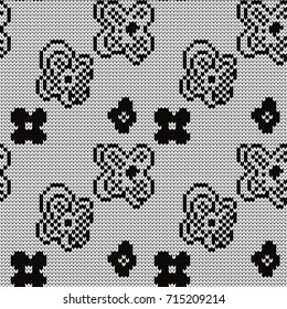 Knitted seamless pattern flowers