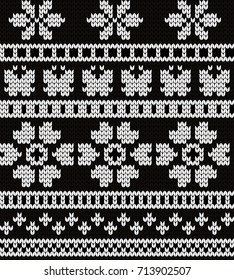 Knitted seamless pattern flowers and butterflies