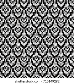 Knitted seamless pattern hearts and scales