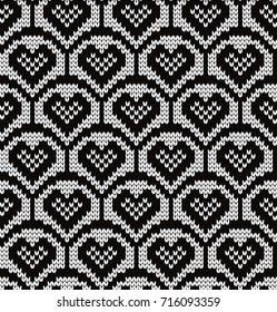 Knitted seamless pattern hearts in scales