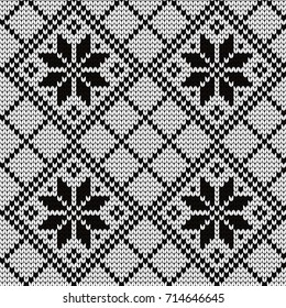 Knitted seamless pattern norwegian stars in rhombuses