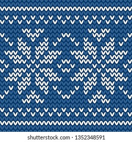 Knitted seamless pattern on blue