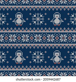 Knitted seamless pattern with penguins, snowflakes, and scandinavian ornament. Winter sweater background. Vector illustration.