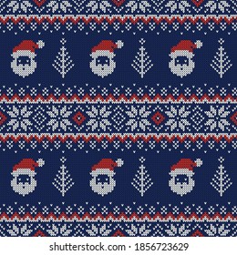 Knitted seamless pattern with Santa Clauses, Christmas trees and scandinavian ornaments. Vector background. Blue, red and white sweater print.