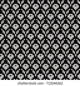 Knitted seamless pattern small flowers