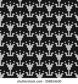 Knitted seamless pattern small tulips