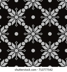 Knitted seamless pattern snowflakes