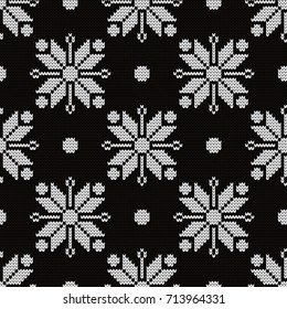 Knitted seamless pattern snowflakes