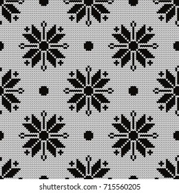 Knitted seamless pattern snowflakes