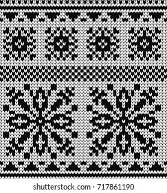 Knitted seamless pattern snowflakes