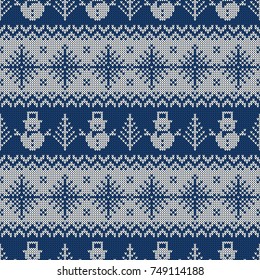 Knitted seamless pattern with snowmen and snowflakes. Blue and white sweater background for Christmas or winter design. Vector ornament.