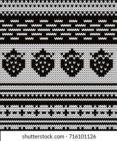 Knitted seamless pattern strawberries and fair isle elements