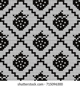 Knitted seamless pattern strawberries in rhombuses