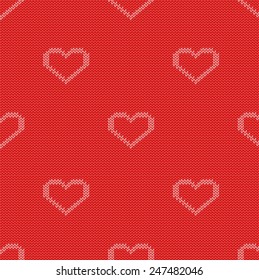 Knitted seamless pattern with white contours of hearts on a red background. Vector eps 10.