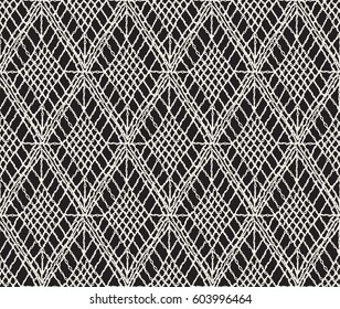 Knitted seamless patterns. Crochet mesh. Knitting or woven macrame in the bohemian style. Oriental motifs.