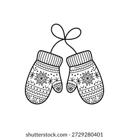 Knitted snowflake patterned mittens tied together with a string