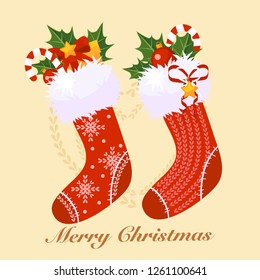 Knitted sock with Christmas gifts. Candy, Christmas toys and holly. Cute greeting card for christmas or new year.