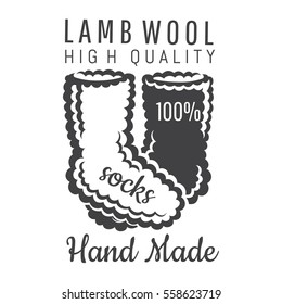 Knitted socks black and white. Logo for craft related site or business