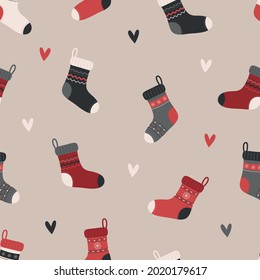 Knitted socks and hearts. Seamless pattern. Merry Christmas. Happy New Year. Vector illustration