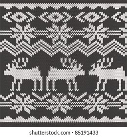 Knitted swatch with deers and snowflakes pattern