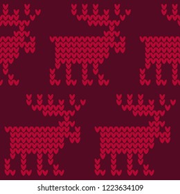 A knitted sweater with Reindeer. Seamless vector background. Christmas pattern. Can be used for wallpaper, textile, invitation card, wrapping, web page background.