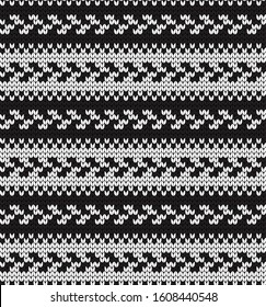 Knitted vector seamless decorative abstract striped black and white pattern
