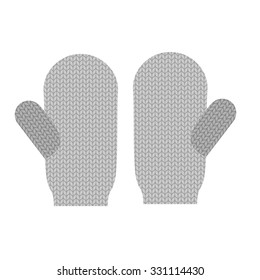 Knitted warm mittens. Wool Winter clothing accessories. Mittens for cold weather.