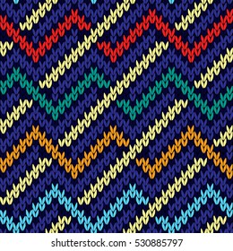 Knitted wavy multicolor background in red, blue, beige, orange and turquoise colors, seamless knitting vector pattern as a fabric texture
