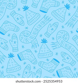 Knitted Winter Accessory Doodle Seamless Pattern. Hand drawn warm clothes and snowflakes on blue background. Seasonal wallpaper repeat vector illustration.