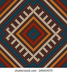 Knitted Wool Pattern in Tribal Aztec Style. Seamless Background