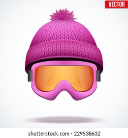 Knitted woolen pink cap with snow goggles. Winter seasonal sport hat. Vector illustration isolated on white background.
