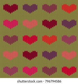 Knitted woolen seamless pattern with colored hearts on mustard background. Valentine's Day