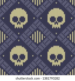 Knitted woolen seamless pattern with skulls in blue tones